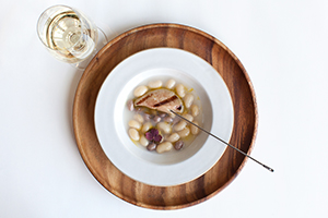 Smoked Foie Gras with Beans in Broth and Fermented TrufflePhoto Courtesy of Kelsey McClellan
